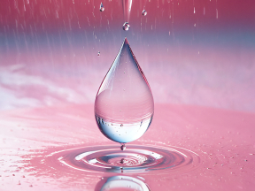 Captivating Clarity: A Single Water Droplet in Light and Reflection