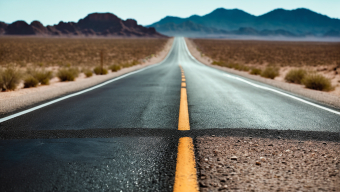 Endless Desert Highway at Dawn: A Journey Through Vast Isolation