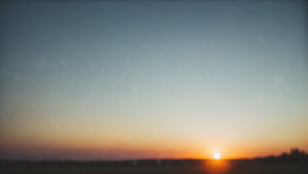Serene Sunset: A Radiant Horizon Bathed in Warm and Cool Tones