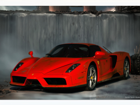 Sleek Red Sports Car on Industrial Dock: A Dynamic and Realistic Automotive Portrait