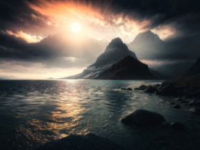 Serene Dawn: Majestic Mountains and Tranquil Waters at Sunrise