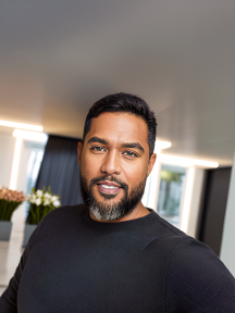 Serene Journey: A Mother and Child by the River in Traditional Attire