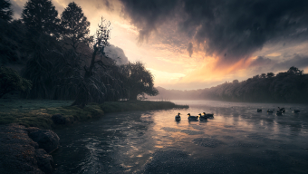 Tranquil Lakeside Scene at Dawn with Gentle Boat and Lush Forest Surroundings