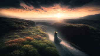 Solitary Contemplation at Sunrise: A Cliffside View Over Tranquil Waters