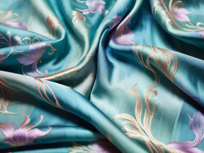 Intricate Floral and Paisley Silk Fabric in Rich Blue, Purple, and Gold Tones