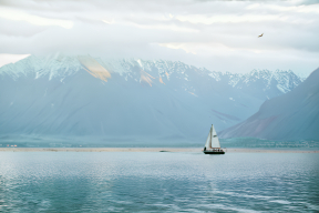 Tranquil Reflections: A Serene Mountain Lake at Dawn