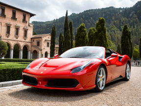Iconic Red Ferrari Parked on Historic Italian Cobblestone Street