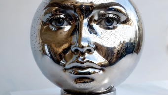 Reflections of Identity: A Metallic Abstract Sculpture of the Human Face