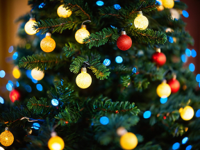 Festive Christmas Tree Adorned with Colorful Ornaments and Twinkling Lights