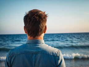 Contemplative Moments by the Ocean: A Serene Day at the Beach