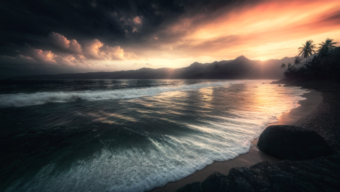 Sunrise Serenity: A Dramatic Coastal Landscape of Waves and Silhouetted Cliffs